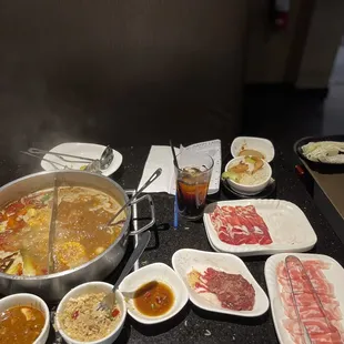 Round 1! I got the half and Half but preferred the non spicy. garlic beef/ friend rice &amp; lamb