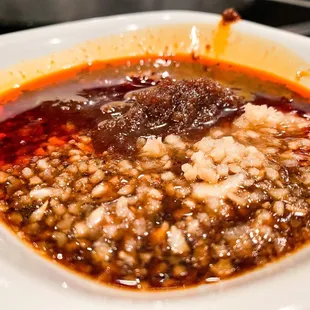 a close up of a bowl of soup