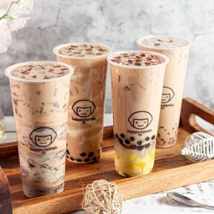 three bobda milk teas on a tray