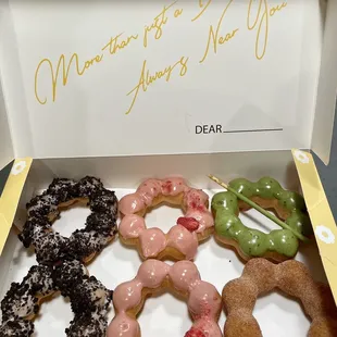 Mochinut half dozen (cookies and cream, strawberry, matcha with pocky, churro)