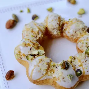 a doughnut with icing and nuts