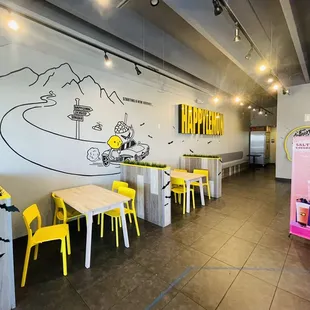 yellow chairs and tables