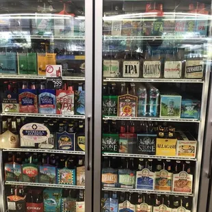 a refrigerator full of bottles of beer