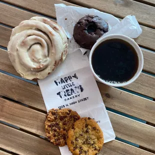 two donuts and a cup of coffee