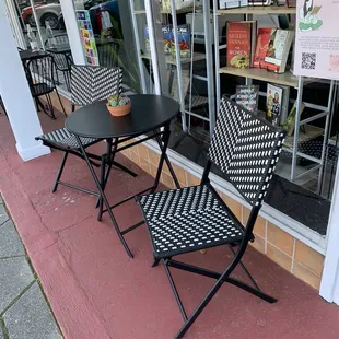 A little bit of outdoor seating. (There's a second table, with chairs, available.)