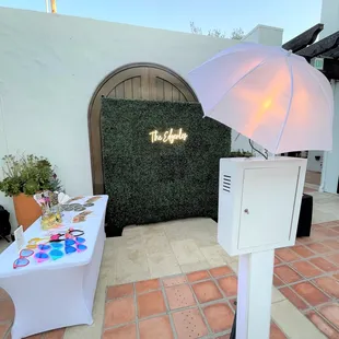 Ask us about our beautiful hedge wall backdrop!