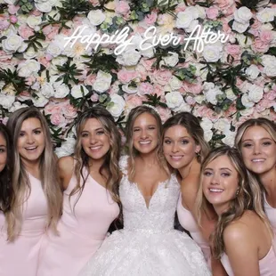 Neon sign and flower wall rental