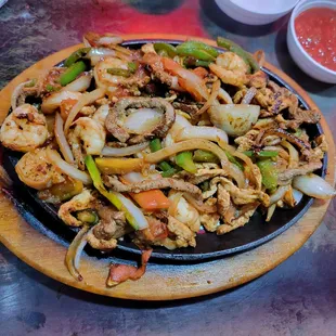 Happy fajitas (steak, chicken, &amp; shrimp)