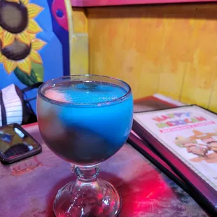 Blue hawaiin mixed with fruit punch frozen margarita