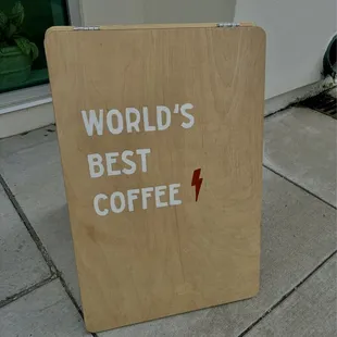 Signage outside coffee shop: World's Best Coffee
