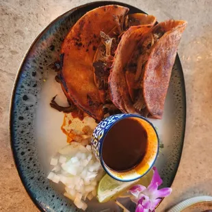 My friend got the Birria tacos and thoroughly enjoyed them.