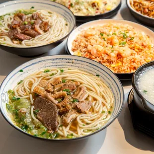 a variety of bowls of food on a table