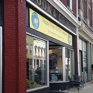 people walking down the sidewalk