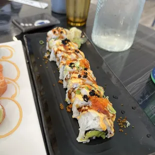 Lion Queen - baked CA roll topped with scallops