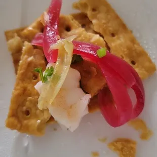 Shrimp ceviche on fried saltine