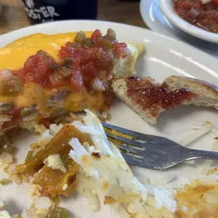 Lots of good green Chile in their Roosterville Special omelette. I added their salsa to put on top. Delicious!