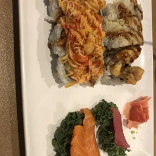 Sashimi on the right, spider roll half eaten, suspect Novi roll