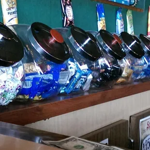 Old school candy jars, never seen this in a bar.