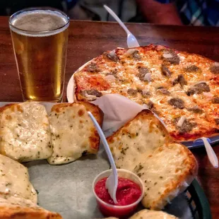 12" pizza and an order of cheesy garlic bread. $2 pint.
