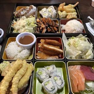 2 Dinner bentos - top: chicken teriyaki with the yummy yummy roll, bottom: chicken katsu with sashimi