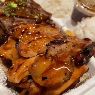 2-Item Combo. Chicken Teriyaki and Beef Galbi (Short Ribs). Comes with 2 scoops of Rice and a Salad.