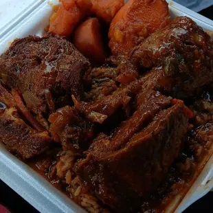 Stew chicken yams rice and peas