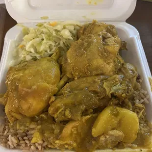 Large Curry Chicken, rice and peas, and cabbage.