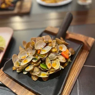 Shovel stir fry clam