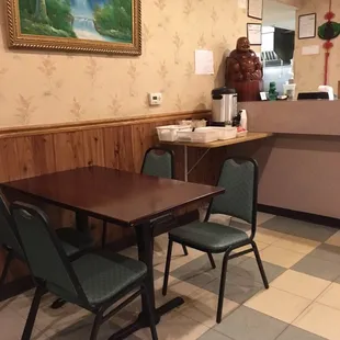 a table and chairs in a restaurant