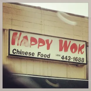 A picture of their sign on a rainy day when my heart was warmed by their sweet sweet chicken.