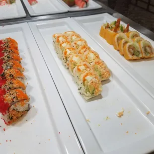 a variety of sushi rolls
