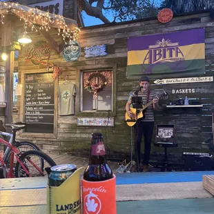 Excellent Live music, atmosphere and Louisiana beers in provided koozies.
