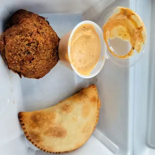 Pepper jack boudin ball with remoulade. Meat pie.