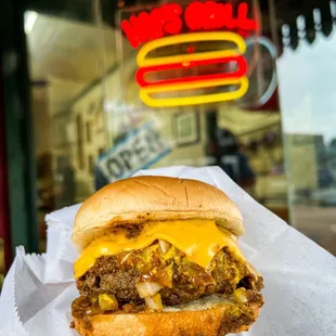 a cheeseburger in a bun