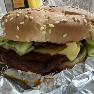 Hot sausage on bun w/ cheeese dressed
