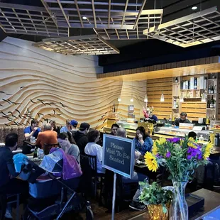 a large group of people eating