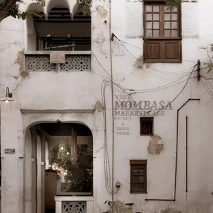 a bicycle parked in front of a building