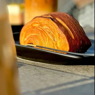 a croissant on a plate