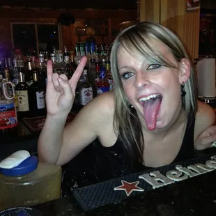 a woman sticking out her tongue