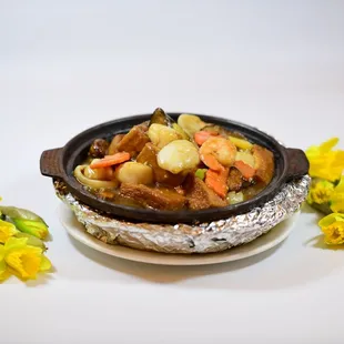 Mixed seafood in clay pot