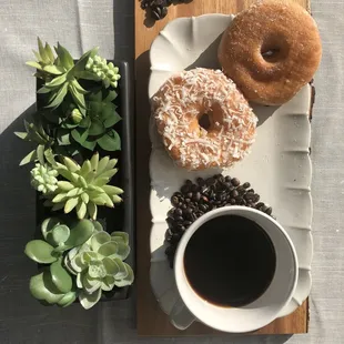 coffee and doughnuts on a tray