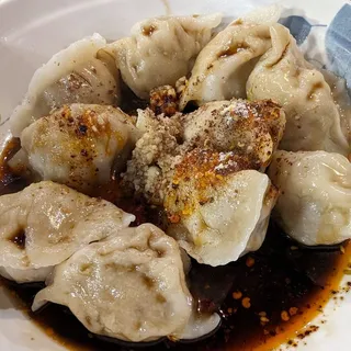 24. Pork Dumplings In Chili Oil (10) (Spicy) 24. (10)