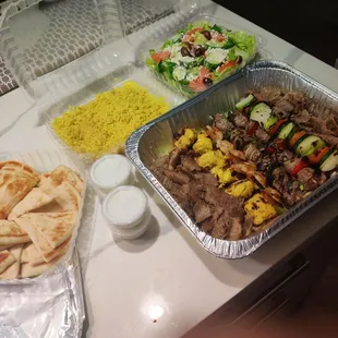 Kabab sampler / Family meal, not a bad deal for under $50. We will eat will tonight. Comes with Rice, salad and pita