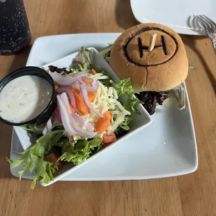 Goats cheese hamburger and side salad