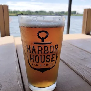 a glass of beer on a table