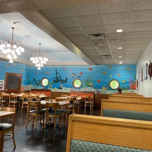 Dining Room with beautiful mural in the background.