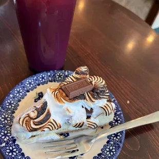 a slice of cake and a drink