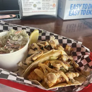 Catch of the day mahi tacos.  Overflowing with fish.