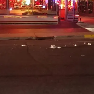 Clean sidewalk. The trash is no longer this restaurant owner's problem.