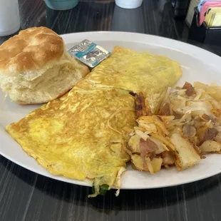 Fresh Veggie &amp; Cheese omelette, biscuit, and potatoes